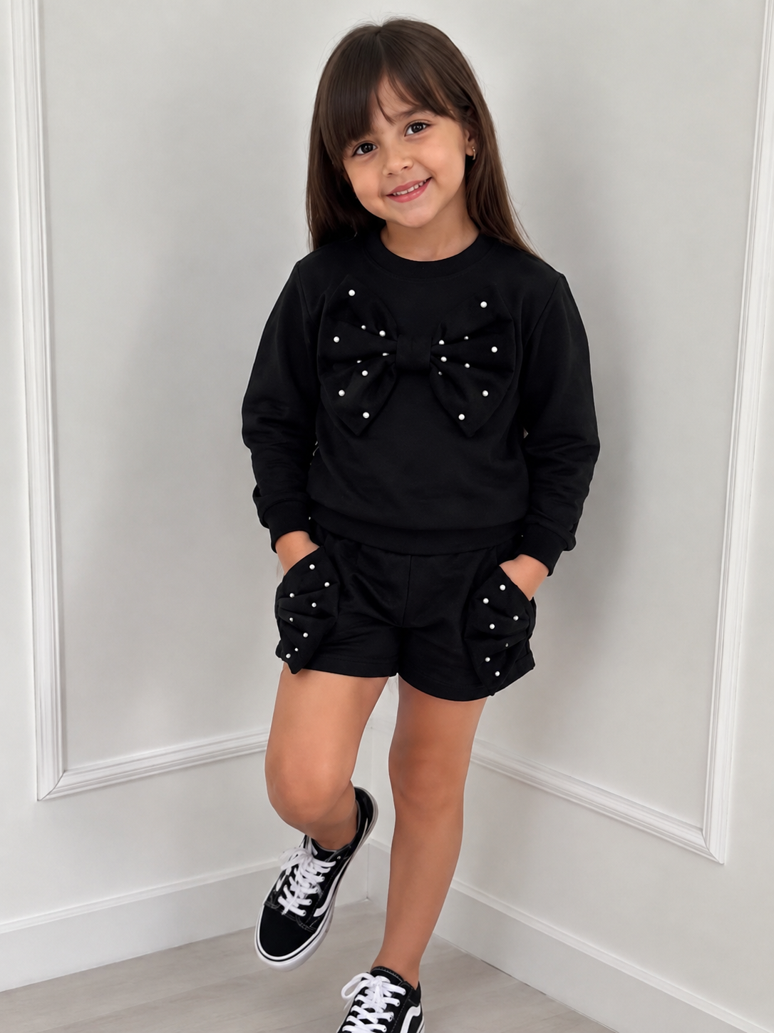 Blusa moletom infantil peluciada com laço e pérolas